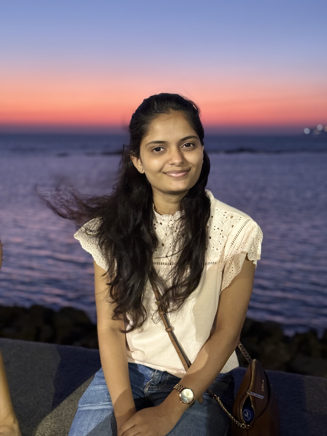 Shrushti at sunset by the sea